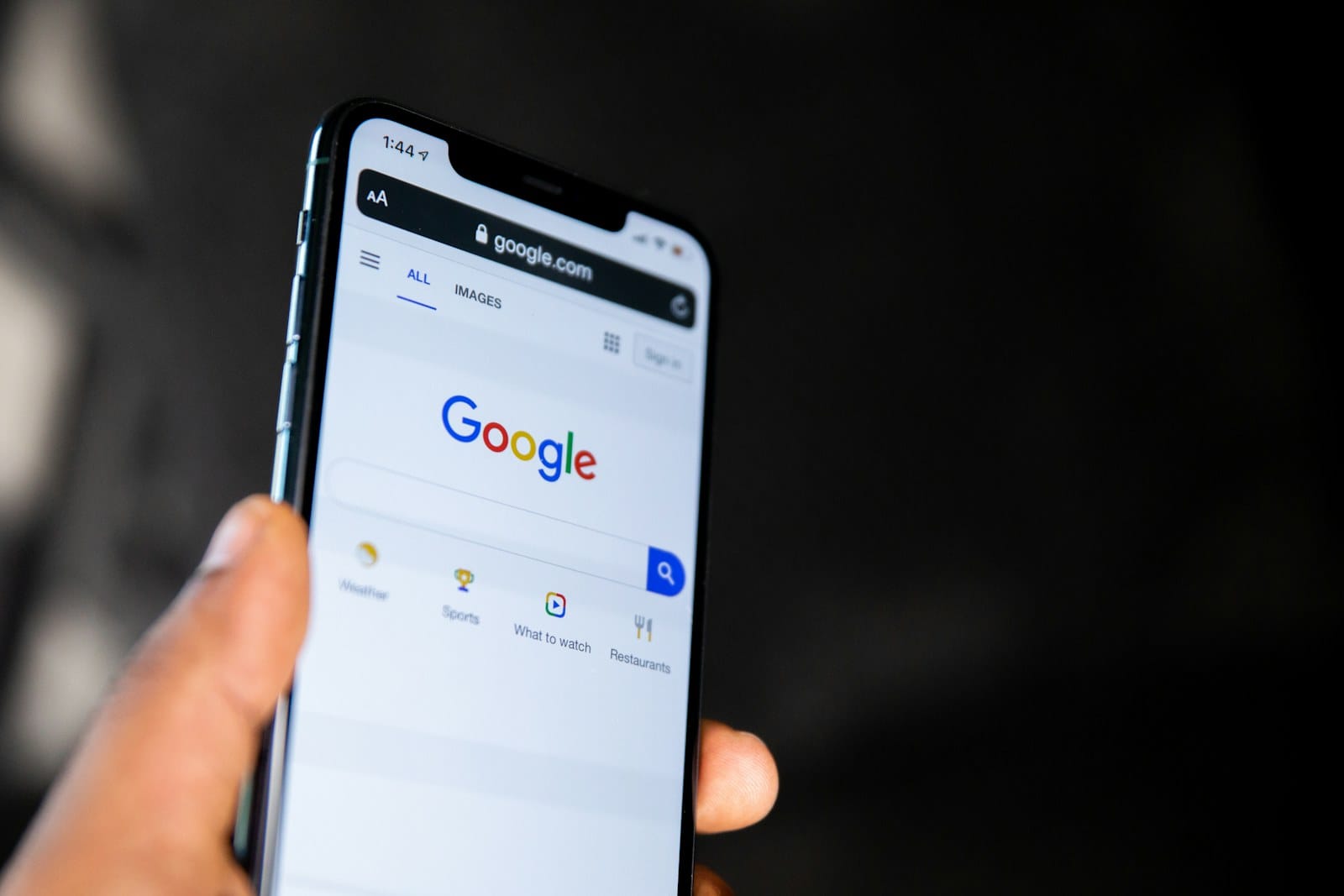The Google homepage open on a phone.